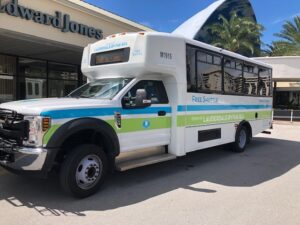 Pelican Hopper Shuttle is parked outside a strip mall in LBTS.